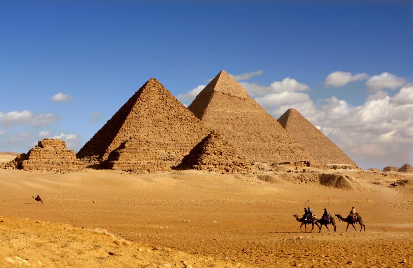 Pyramids Giza Cairo In Egypt With Camel Caravane Panoramic Scenic View